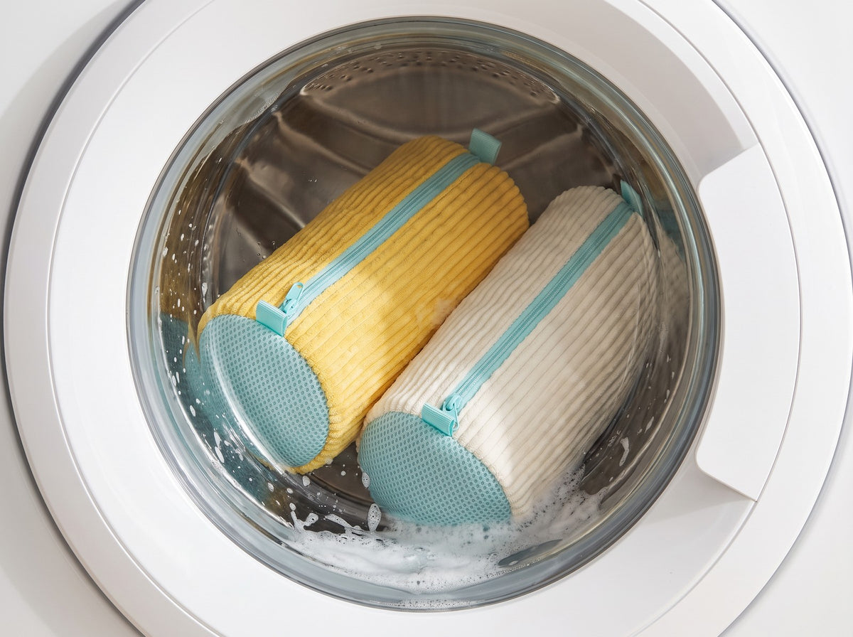 Sacs fermés dans le tambour de la machine à laver